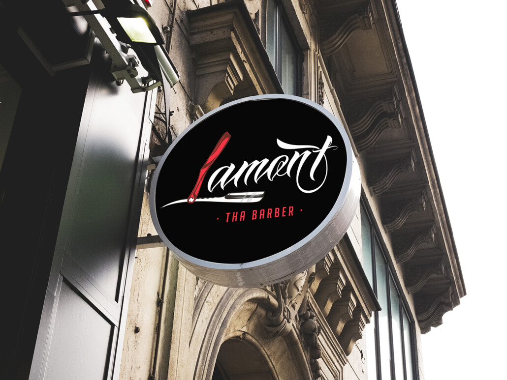 Lamont tha Barber Logo Design on Storefront Sign